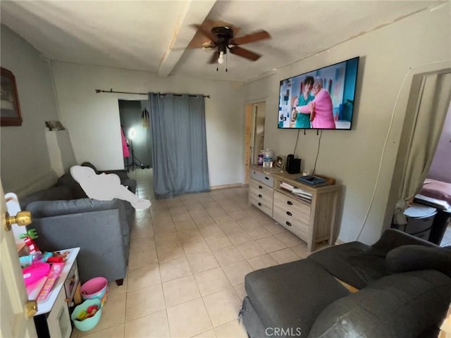 tiled living room with ceiling fan