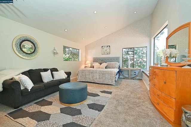 bedroom featuring multiple windows, light carpet, and high vaulted ceiling