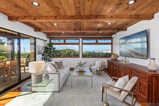 sunroom / solarium with beamed ceiling and wooden ceiling