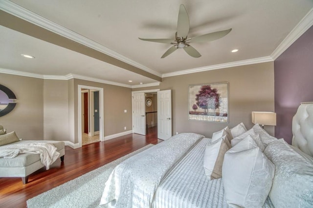 bedroom featuring dark hardwood / wood-style flooring, ornamental molding, and ceiling fan