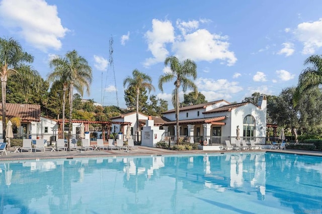 view of swimming pool with a patio