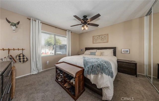 bedroom featuring ceiling fan and carpet floors