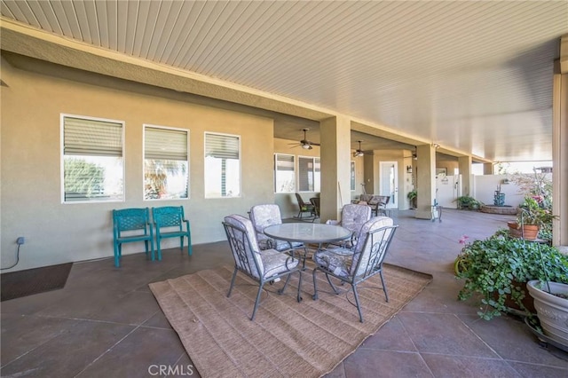 view of patio / terrace featuring ceiling fan