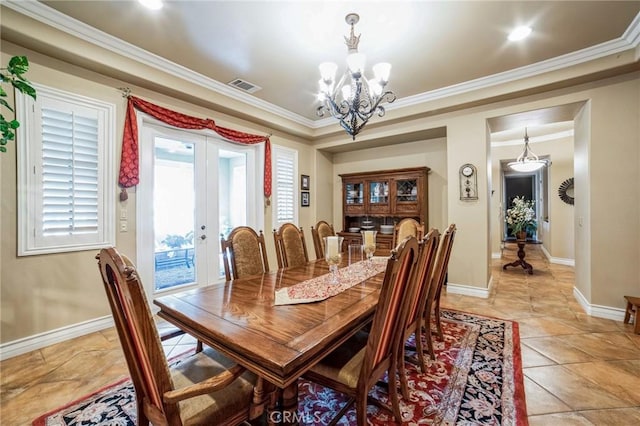 dining area featuring ornamental molding, light tile patterned floors, a chandelier, and french doors