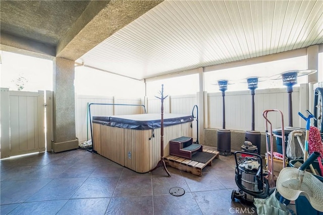 interior space with a hot tub