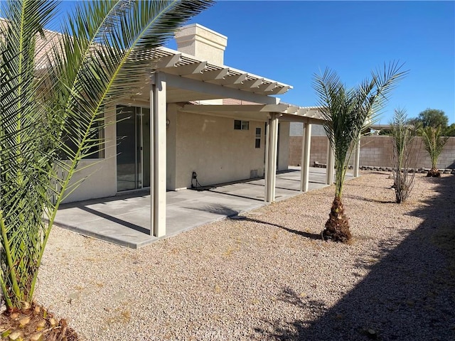 rear view of house featuring a patio area