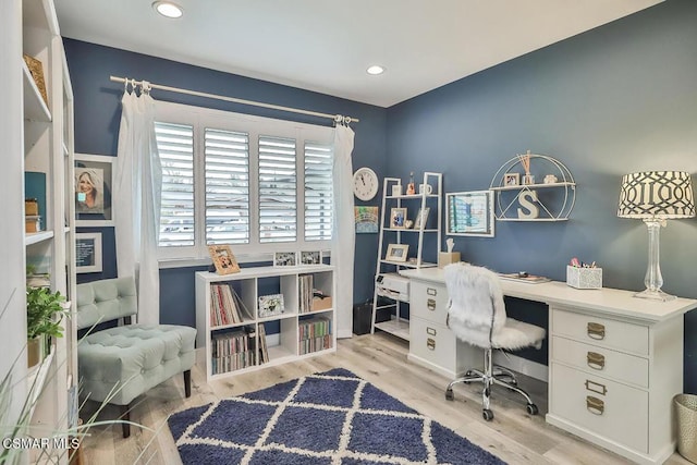 office area with light hardwood / wood-style flooring