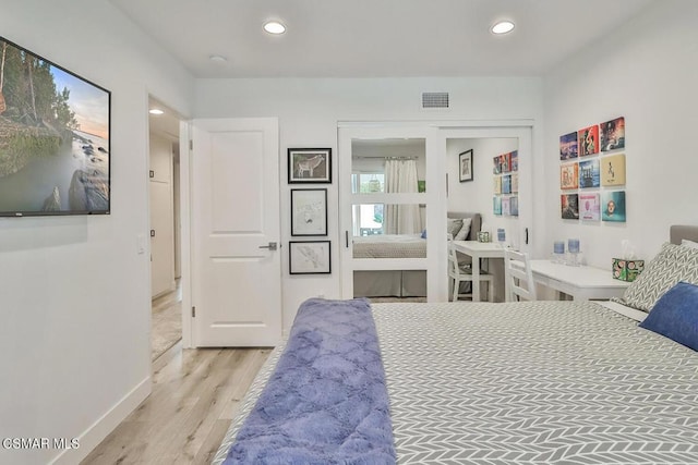 bedroom featuring light hardwood / wood-style flooring