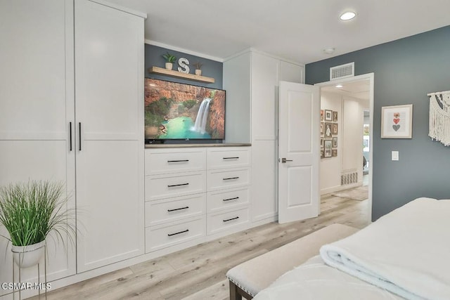 bedroom featuring light hardwood / wood-style floors