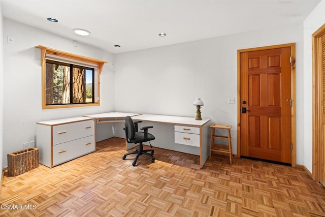 home office with light parquet floors