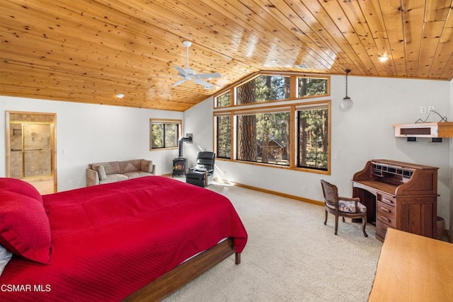 bedroom featuring lofted ceiling, wood ceiling, and carpet flooring