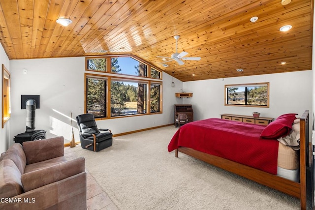 carpeted bedroom featuring lofted ceiling, a wood stove, and wood ceiling