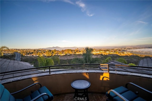 balcony featuring a mountain view