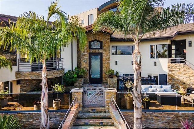 view of front of home with an outdoor hangout area