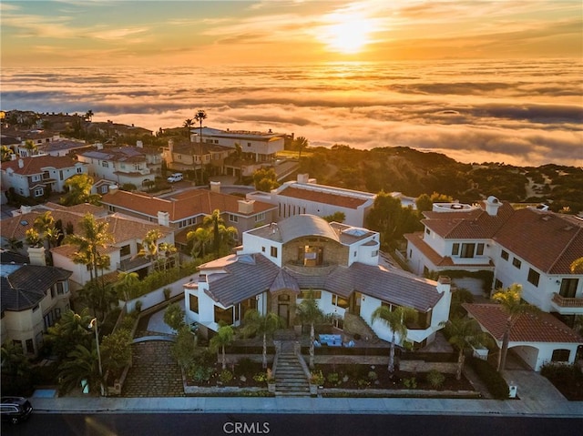 view of aerial view at dusk