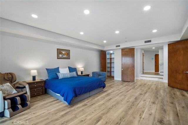 bedroom featuring light hardwood / wood-style flooring