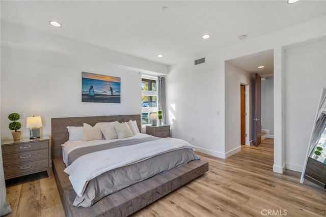 bedroom featuring light wood-type flooring