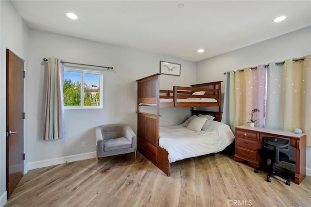 bedroom with light hardwood / wood-style flooring