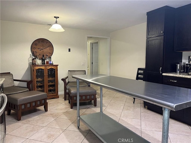 recreation room featuring light tile patterned floors