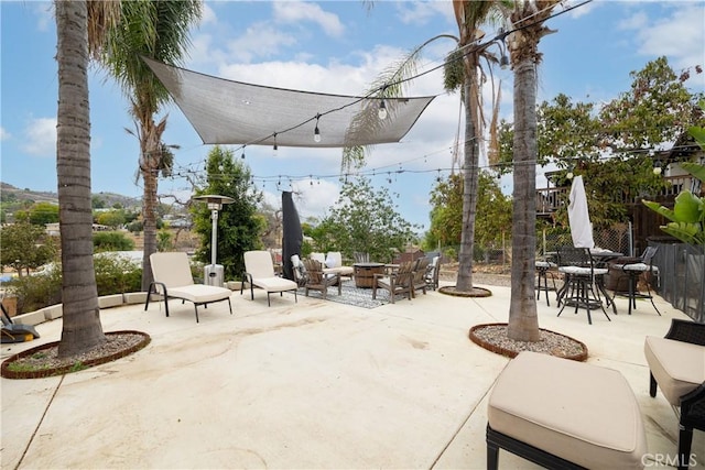 view of patio with an outdoor fire pit