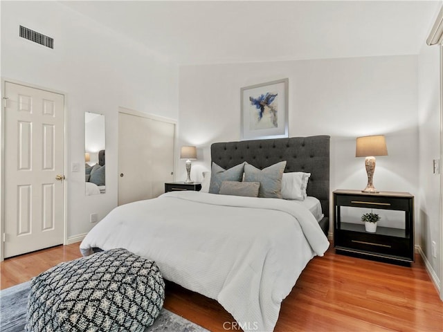 bedroom featuring wood-type flooring