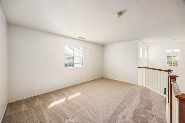 unfurnished room with carpet