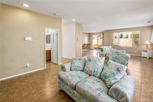 living room with tile patterned floors