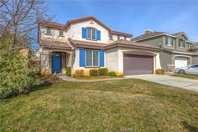 mediterranean / spanish house with a garage and a front yard