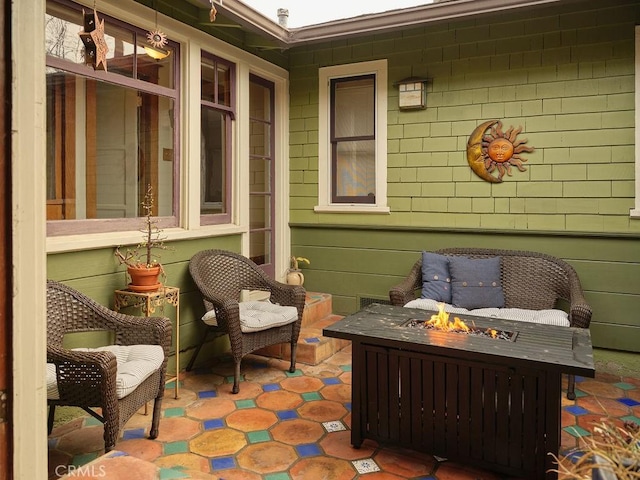 view of patio featuring an outdoor fire pit