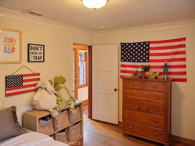 bedroom featuring hardwood / wood-style flooring