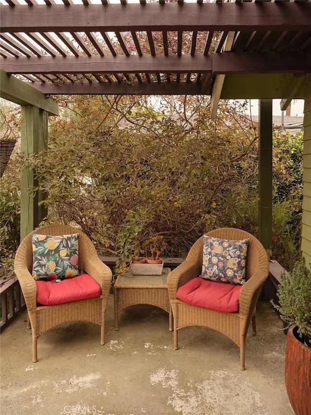 view of patio featuring a pergola