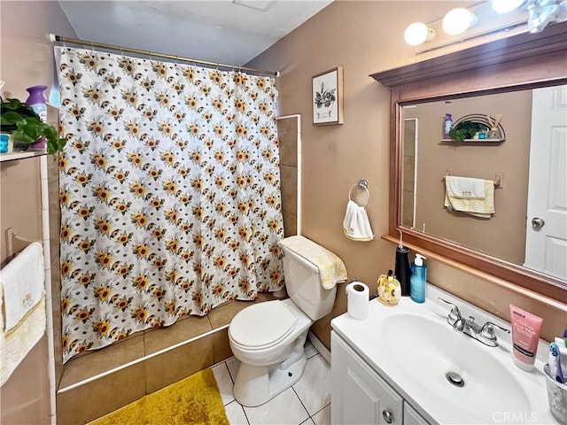 bathroom with a shower with shower curtain, vanity, toilet, and tile patterned flooring