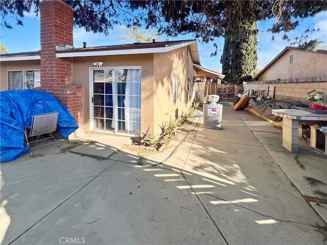 view of home's exterior featuring a patio