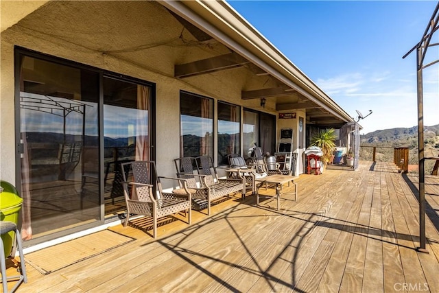 deck featuring a mountain view