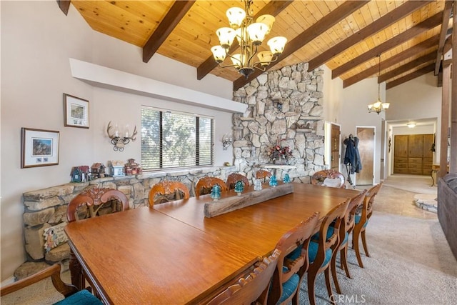 carpeted dining room featuring an inviting chandelier, wood ceiling, high vaulted ceiling, and beamed ceiling