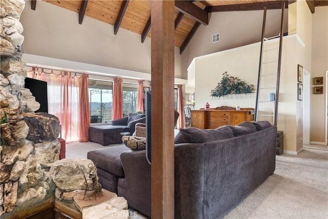 living room with beam ceiling, high vaulted ceiling, light carpet, and wooden ceiling