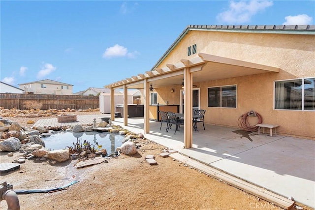 rear view of property featuring a patio