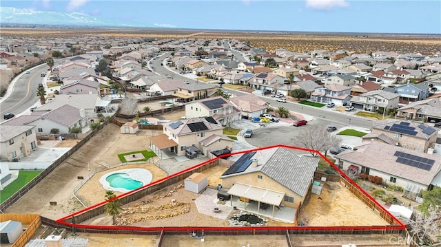 birds eye view of property with a residential view