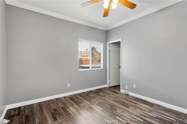 unfurnished room featuring wood finished floors, a ceiling fan, baseboards, and ornamental molding