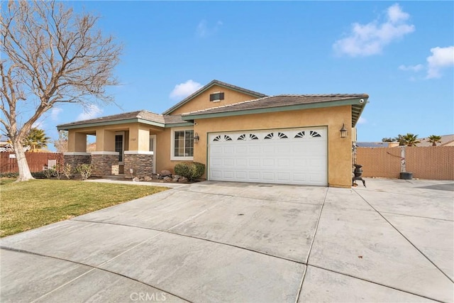 single story home featuring fence, an attached garage, driveway, and stucco siding