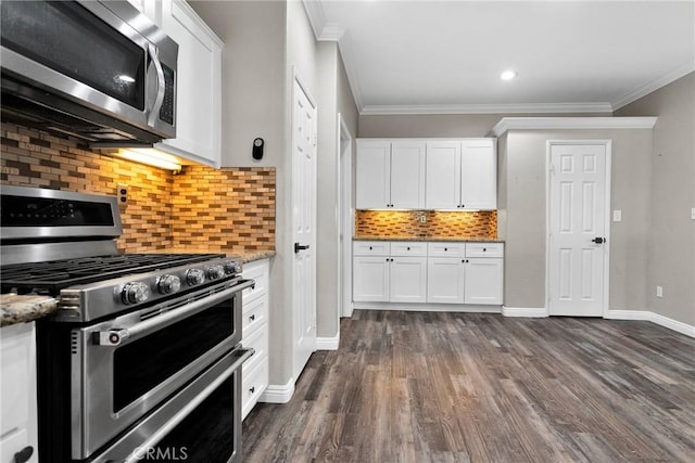 kitchen featuring white cabinetry, appliances with stainless steel finishes, and light stone countertops