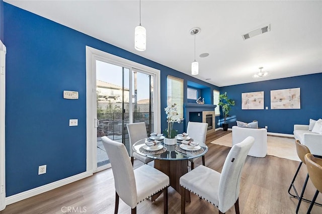 dining room featuring hardwood / wood-style flooring