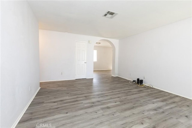 empty room featuring hardwood / wood-style floors