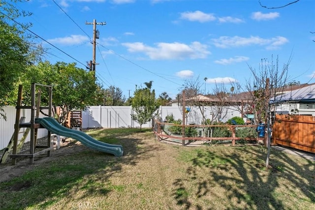 view of yard with a playground