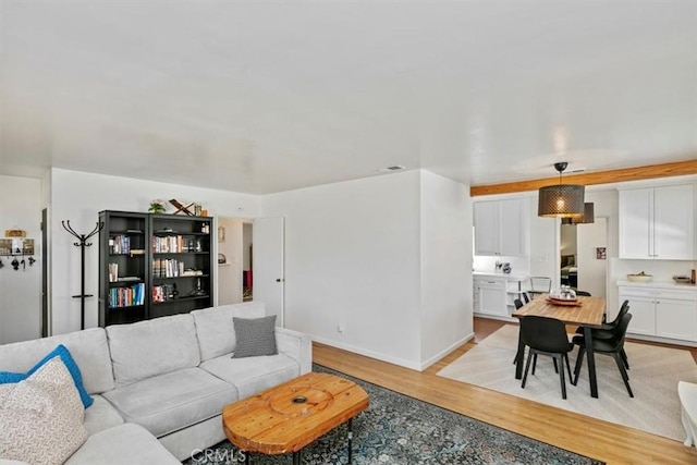 living room with light hardwood / wood-style floors