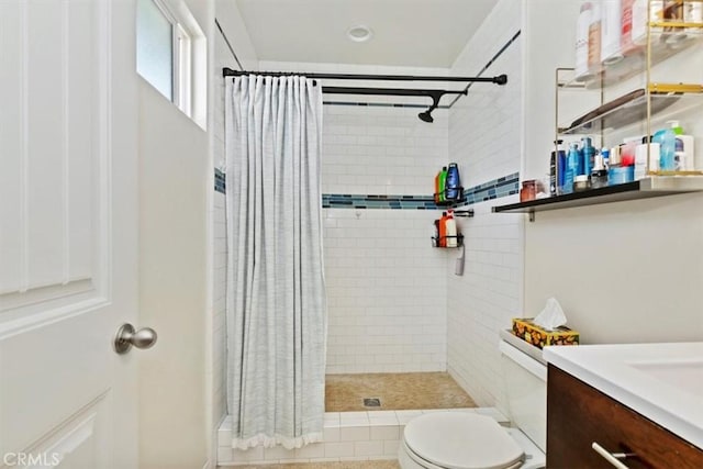 bathroom with vanity, a shower with curtain, and toilet