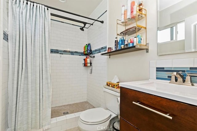 bathroom featuring tasteful backsplash, vanity, toilet, and a shower with curtain