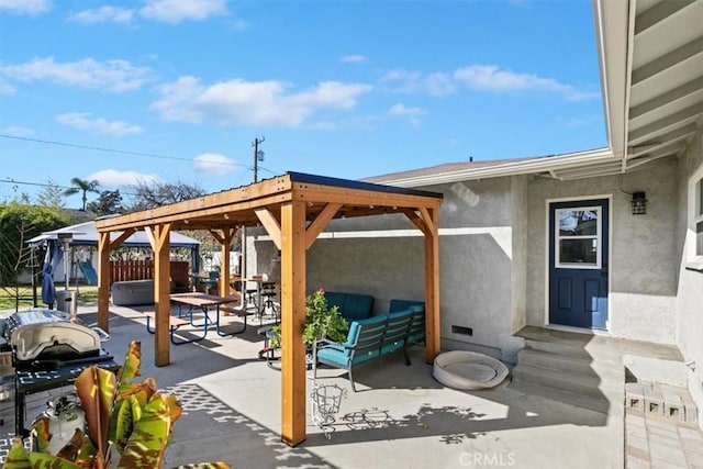 view of patio / terrace featuring an outdoor living space and a gazebo