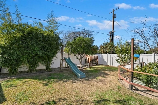 view of yard featuring a playground