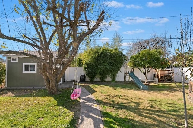 view of yard with a playground